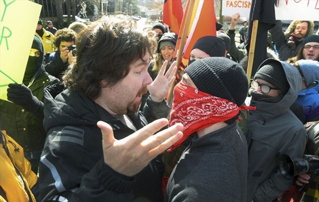 protestors yelling at each other